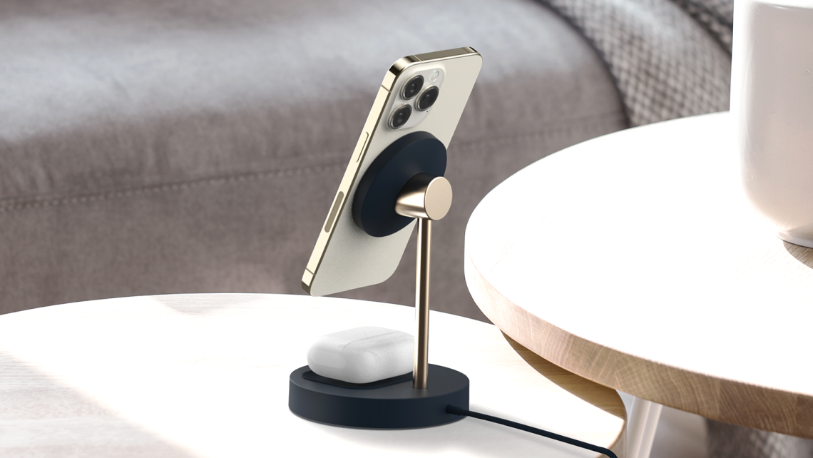 iottie.comvelox-magnetic-wireless-charging-duo-stand_lifestyle Velox Magnetic Wireless Duo Stand Dual Charger for MagSafe iPhones & Qi Accessories Displayed on Living Room Table